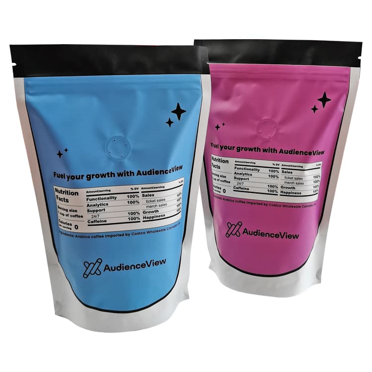 Front and back views of two colorful stand-up coffee pouches with a valve visible