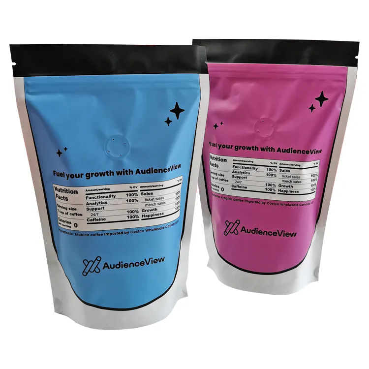 Front and back views of two colorful stand-up coffee pouches with a valve visible